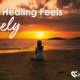 When Healing Feels Lonely woman sitting alone on beach at sunset
